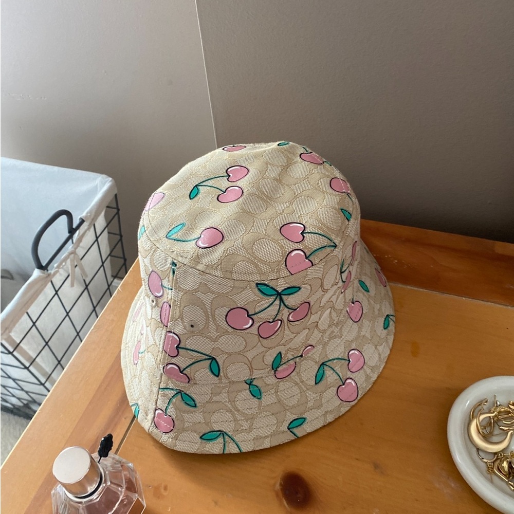 Coach Bucket Hat with Pink Cherry Design